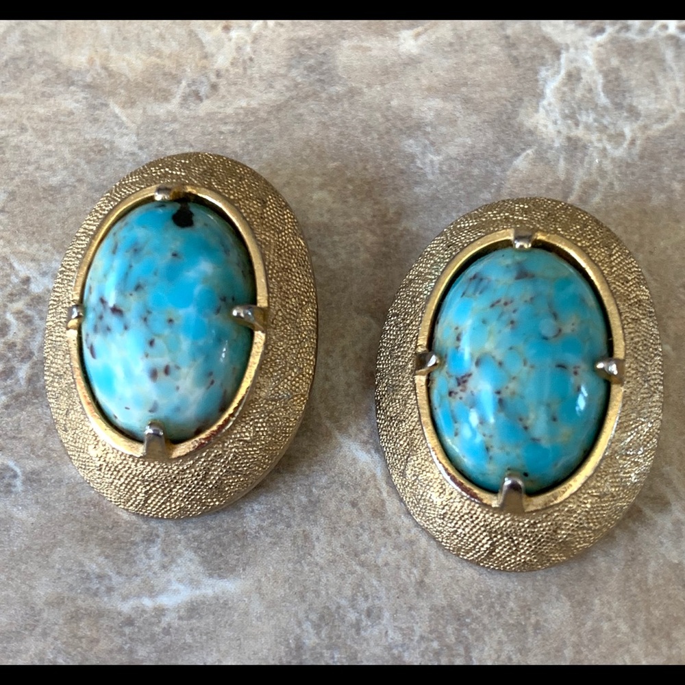 Josef Bobley clip earrings.